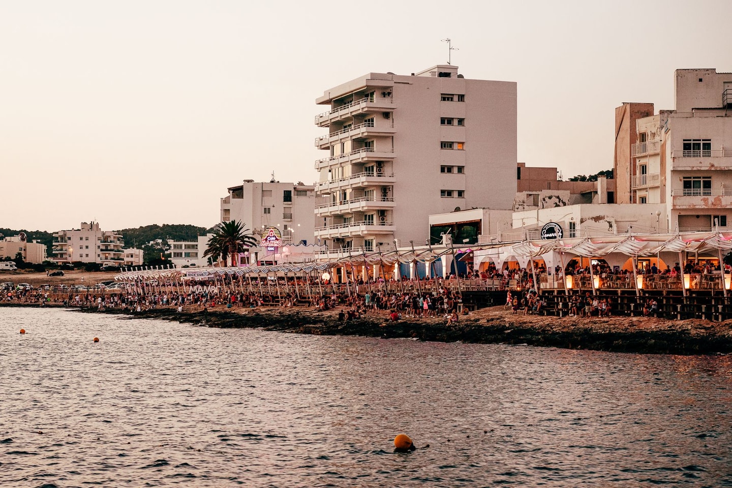 Mediterranean waterfront at sunset
